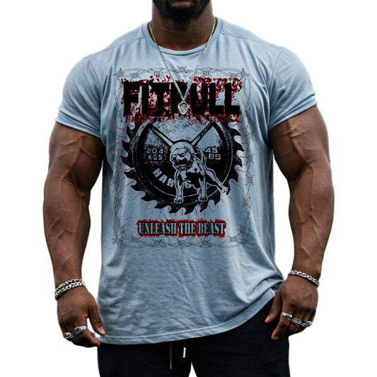A male bodybuilder wears a Fitbull Fit Wear T-shirt with a motivational Unleash The Beast print