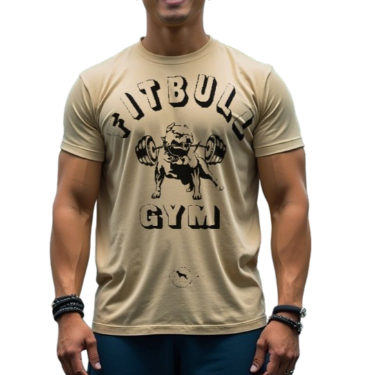 A man with a fitness body is wearing sporty joggers and a sporty beige color Fitbull T-shirt with a motivating Fitbull Gym print.