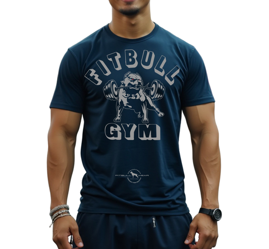 A man with a fitness body is wearing sporty joggers and a sporty dark navy blu Fitbull T-shirt with a motivating Fitbull Gym print.