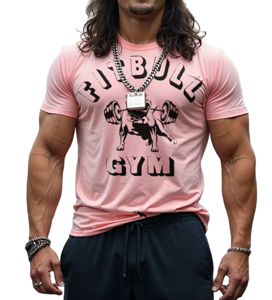 A man with a fitness body is wearing sporty joggers and a sporty pink Fitbull T-shirt with a motivating Fitbull Gym print.