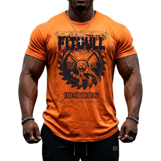 A male bodybuilder wears a orange Fitbull Fit Wear T-shirt with a motivational Unleash The Beast print