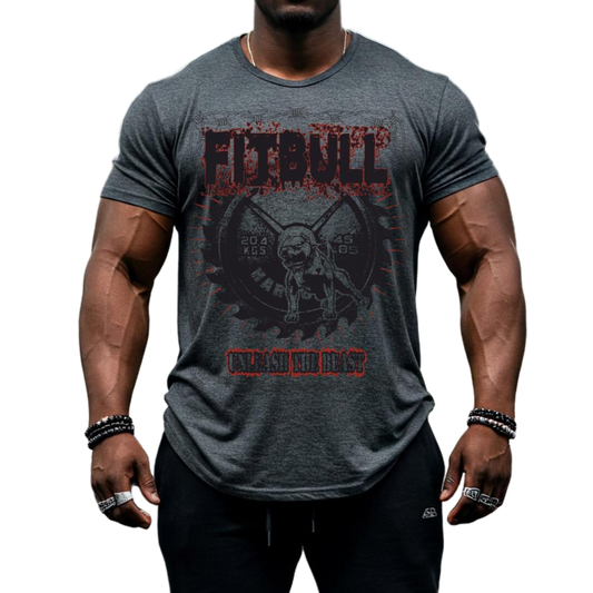 A male bodybuilder wears a dark grey Fitbull Fit Wear T-shirt with a motivational Unleash The Beast print